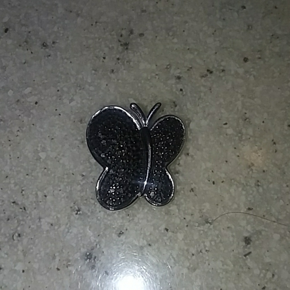 Cute little black diamond butterfly charm